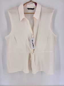 Cream Sleeveless Shirt
