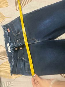Blue Denim Flare Jeans with Frayed Hem
