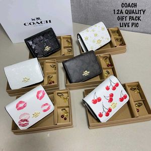 Coach Wallet sling n charm in box packing