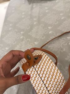 Round Woven Crossbody Bag with Floral Embroidery