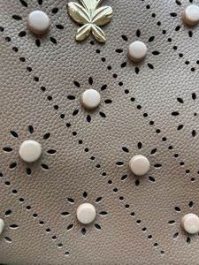 Stylish Taupe Handbag with Perforated Design