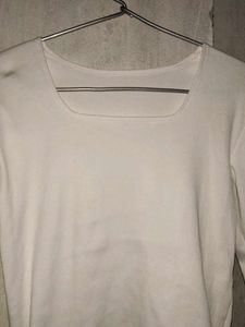 white top , square neck