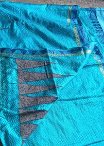 Beautiful Blue Saree with Intricate Patterns