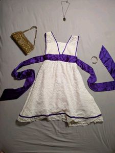 Elegant White Lace Dress with Purple Ribbon