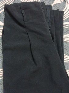 High-Waisted Pleated Trousers