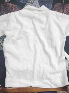 Chic White Jacket with Graphic Tee