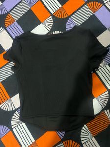 H&amp;M black fitted corset style ribbed top