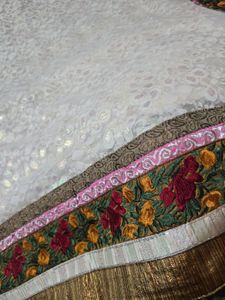 Elegant Off-White Saree with Floral Border