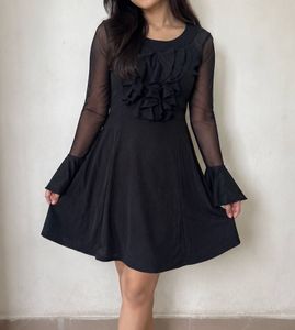 Black ruffle dress with bell sleeves