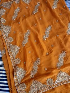Elegant Orange Embroidered Saree