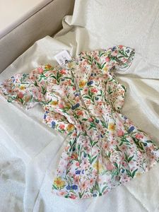 off Floral Print cut out top.