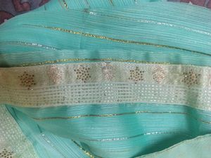 Elegant Teal Saree with Gold Stripes