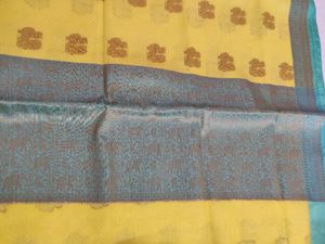 Vibrant Yellow Silk Saree with Elephant Motifs