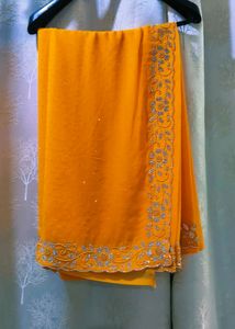 Vibrant laddu yellow colour Diamond Work saree