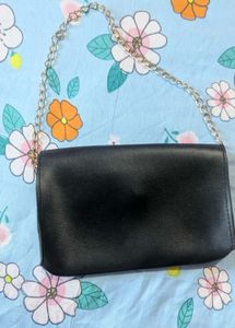 Chic Black Clutch with Gold Accent