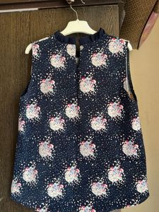 Navy Floral Sleeveless Top with Ruffle Collar