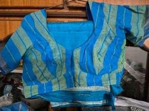 Vibrant Teal Saree with Striped Blouse