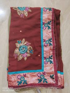 Heavy saree brown with mehndi green color combination used few times but still luks gud