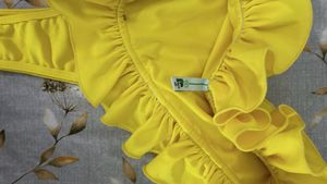 Yellow Ruffled bodysuit