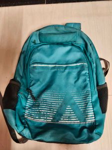 Teal Backpack with Geometric Design