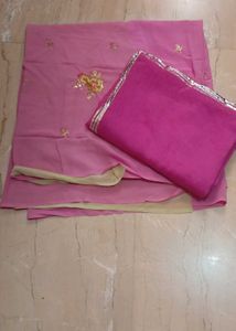 Pink rajputi dress material with blouse piece