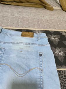 Light Wash Distressed Wide Leg Jeans