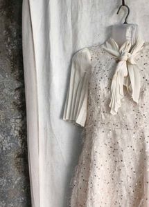 Sparkling White Dress with Bow Detail