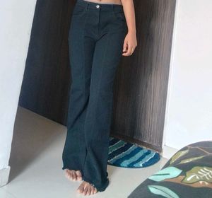 Flared Jeans with Raw Hem