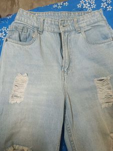 Distressed Light Wash Denim Jeans
