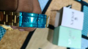 Luxury Gold &amp; Green Rolex Watch