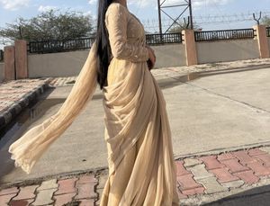 Elegant Beige Embellished Saree