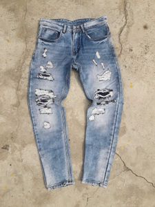 Distressed Blue Denim Jeans