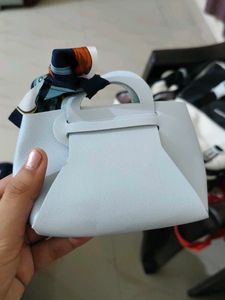 Chic Light Blue Handbag with Scarf Detail