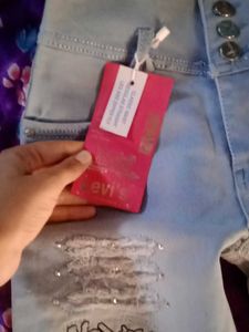 Stylish Ripped Jeans with Embellishments