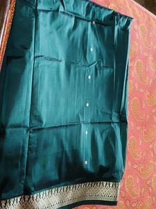 Elegant Teal Saree with Intricate silver Weave