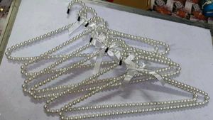 "Elegant Pearl Clothes Hangers