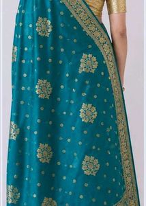 Blue Saree with bangles and earrings