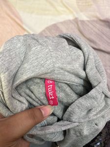 a grey sweatshirt
