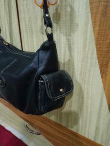 Chic Navy Leather Shoulder Bag with Flower Accent