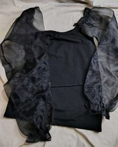edgy ballon sleeve top with skirt