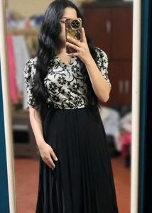 Elegant Floral Print Gown with Pleated Skirt
