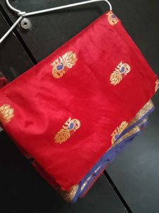 Vibrant Red Silk Saree with Peacock Motifs