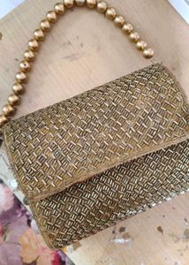 Elegant Beaded Clutch with Gold Chain