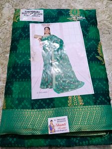 Elegant Green bandhani Saree with Lace Border