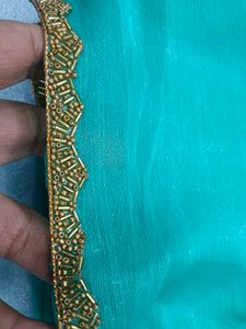 Elegant Teal Saree with Golden Border