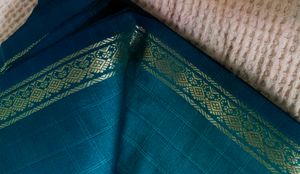 Beautiful Peacock blue Saree with Golden Border