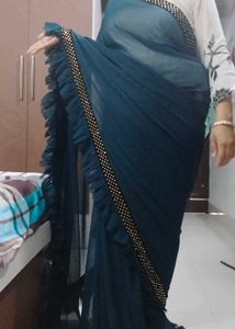 Elegant Teal Saree with Embellishments