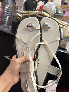 White Flat Sandals with Silver Detail