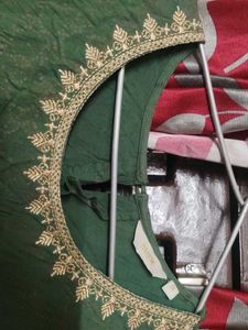 Elegant Green Kurta with Embellished Neckline