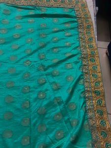 Elegant Teal & Gold Embroidered Saree